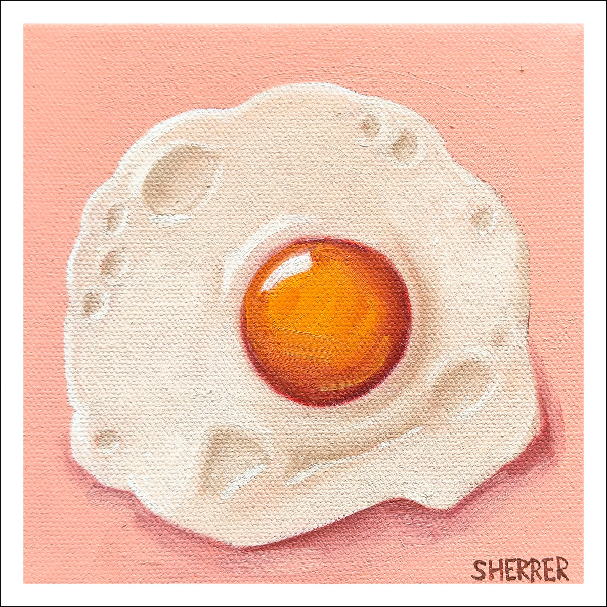 Over Easy II fine art print by Caroline Sherrer, featuring a sunny-side-up fried egg on a light pink background.