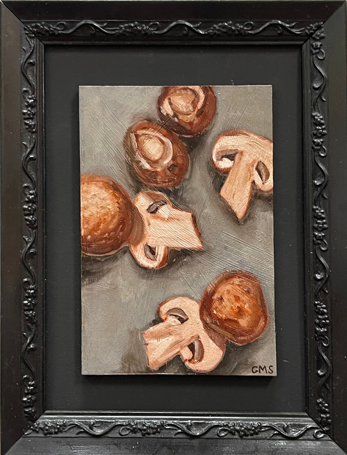 Forest Floor, original oil painting by Caroline Sherrer, featuring sliced brown mushrooms scattered across a gently textured charcoal and gray background.