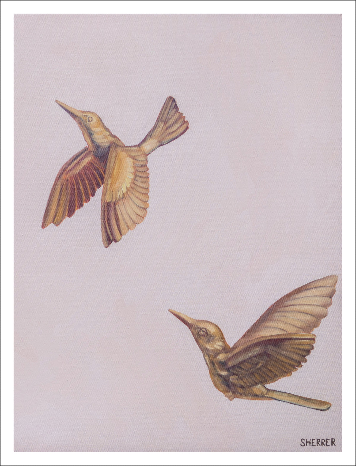Brass Birds Flight II fine art print by Caroline Sherrer, featuring two brass hummingbirds in flight against a soft pinkish beige background.