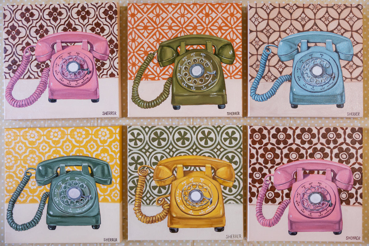 Six colorful rotary-telephone paintings arranged in two rows on a pale polka-dot surface.