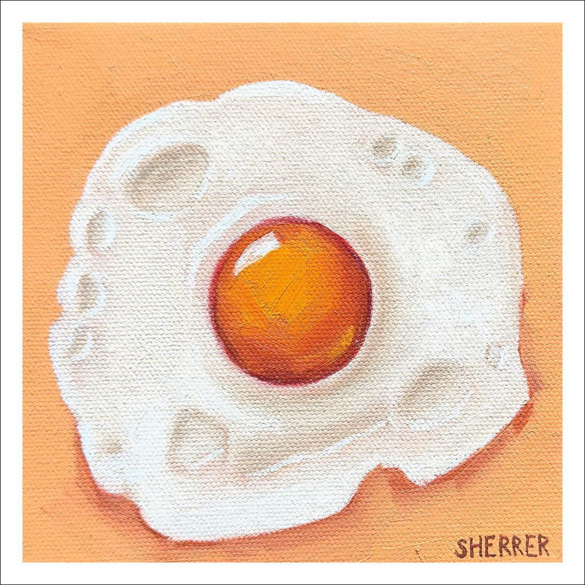 Egg-straodinary fine art print by Caroline Sherrer, featuring a sunny-side-up fried egg on an orange background.