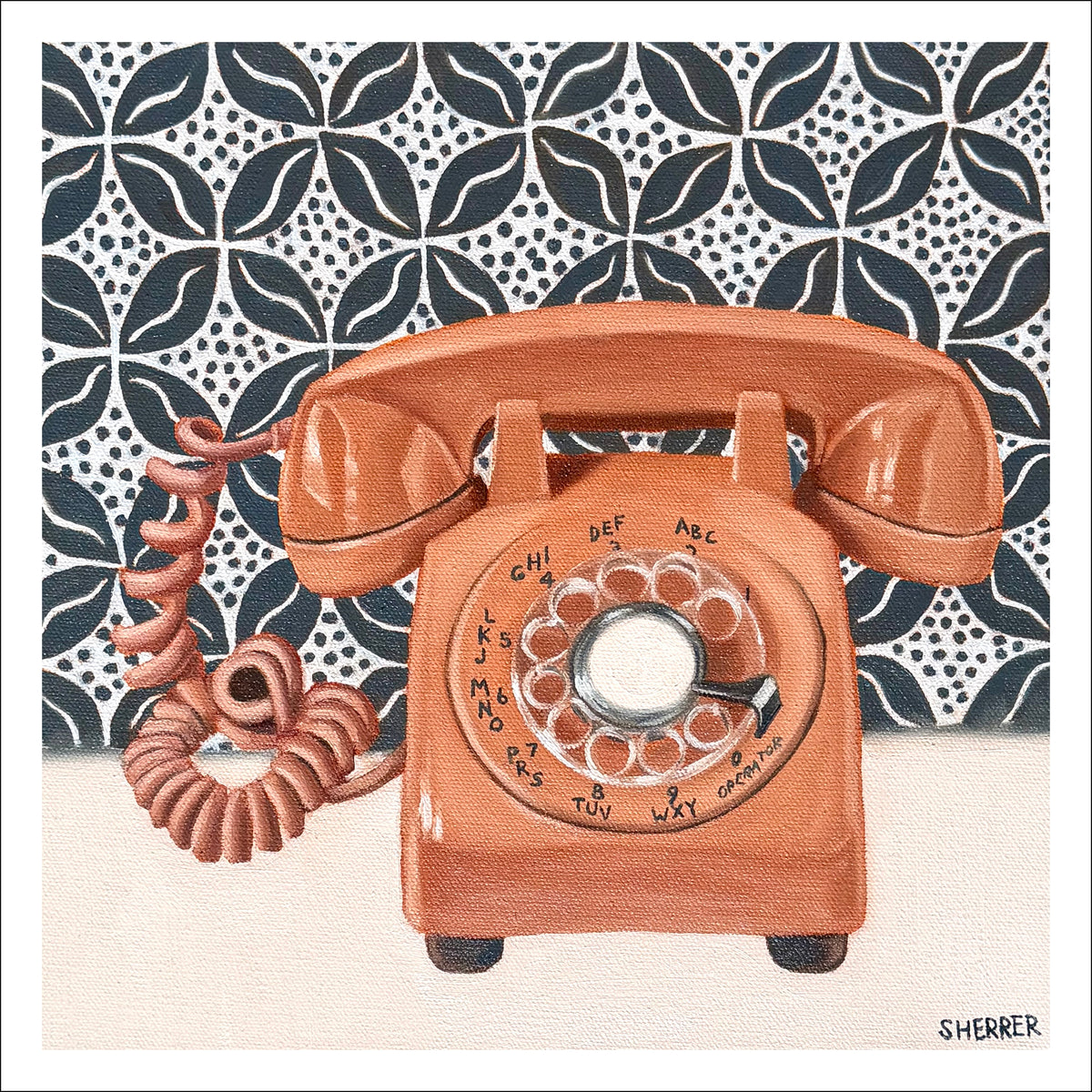 Coral Connection fine art print by Caroline Sherrer, featuring a coral vintage rotary phone on a charcoal and white geometric patterned background. 