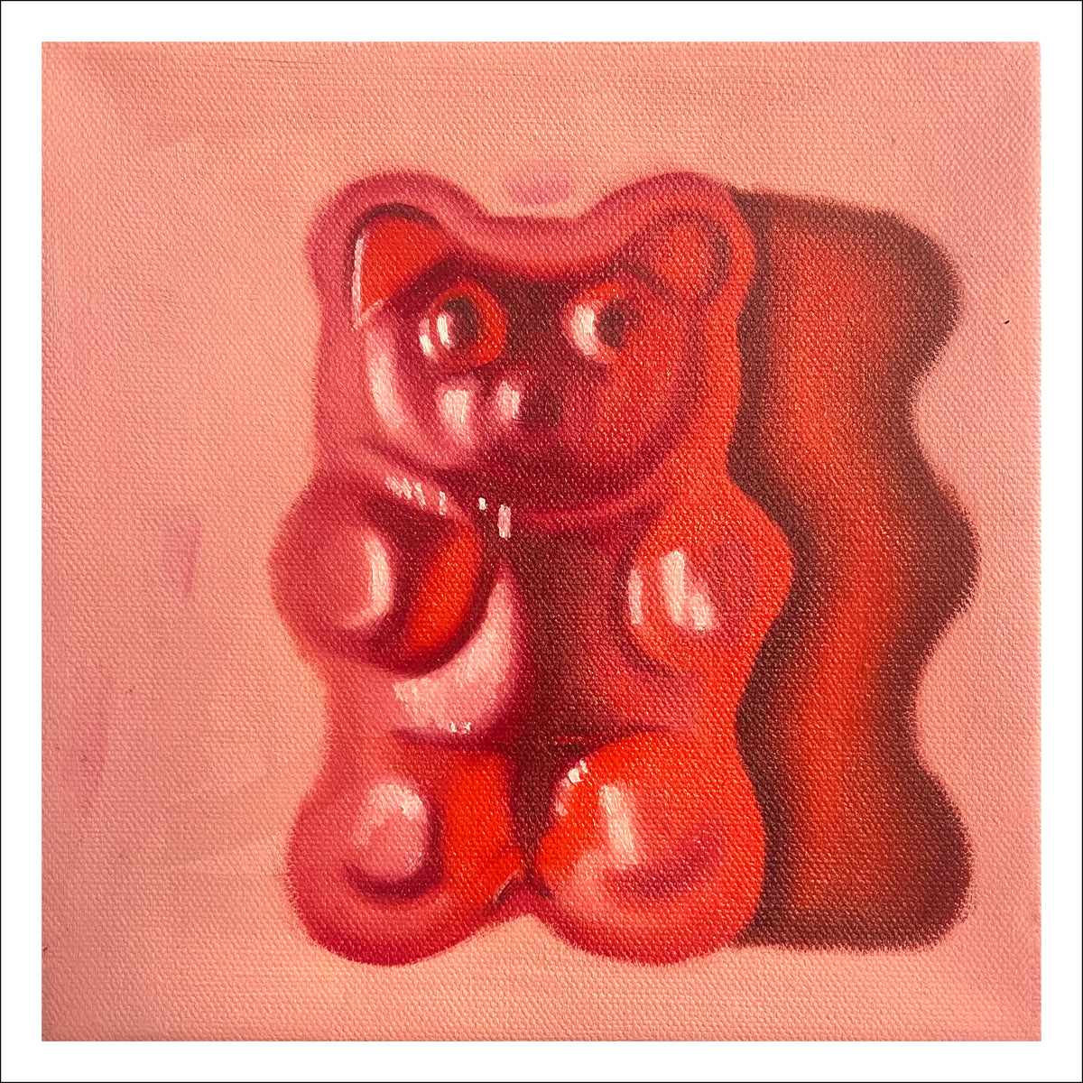 Gummy Bear Pink fine art print by Caroline Sherrer, featuring a translucent pink gummy bear with a strong shadow being cast onto the light pink background.