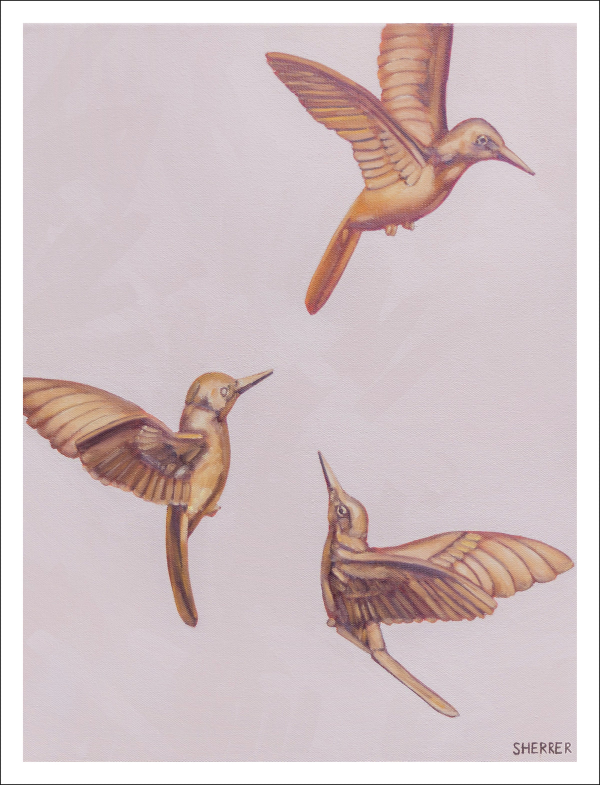 Brass Birds Flight I fine art print by Caroline Sherrer, featuring three brass hummingbirds in flight against a soft pinkish beige background.