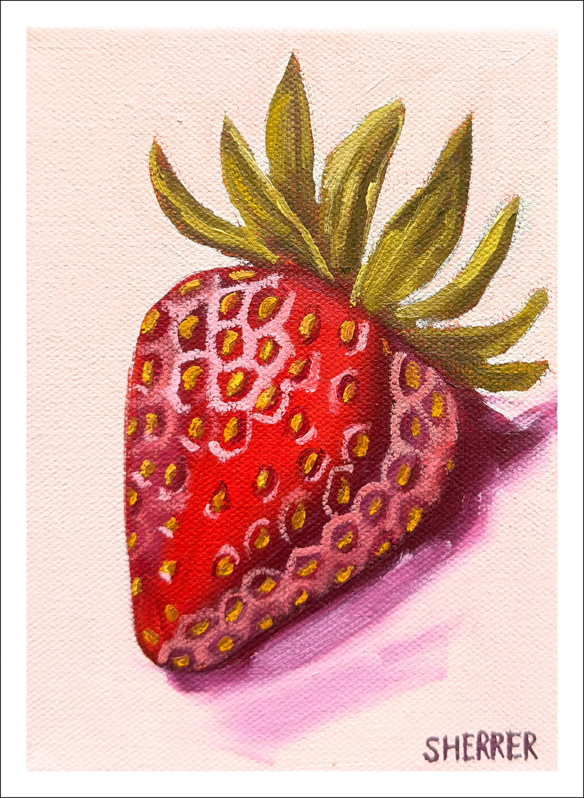 April fine art print by Caroline Sherrer, featuring one red strawberry with green leaves on a pale pinkish white background.