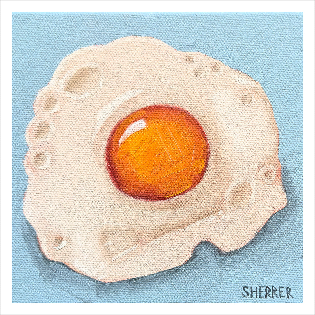Good Morning fine art print by Caroline Sherrer, featuring a sunny-side-up fried egg on a medium blue background.