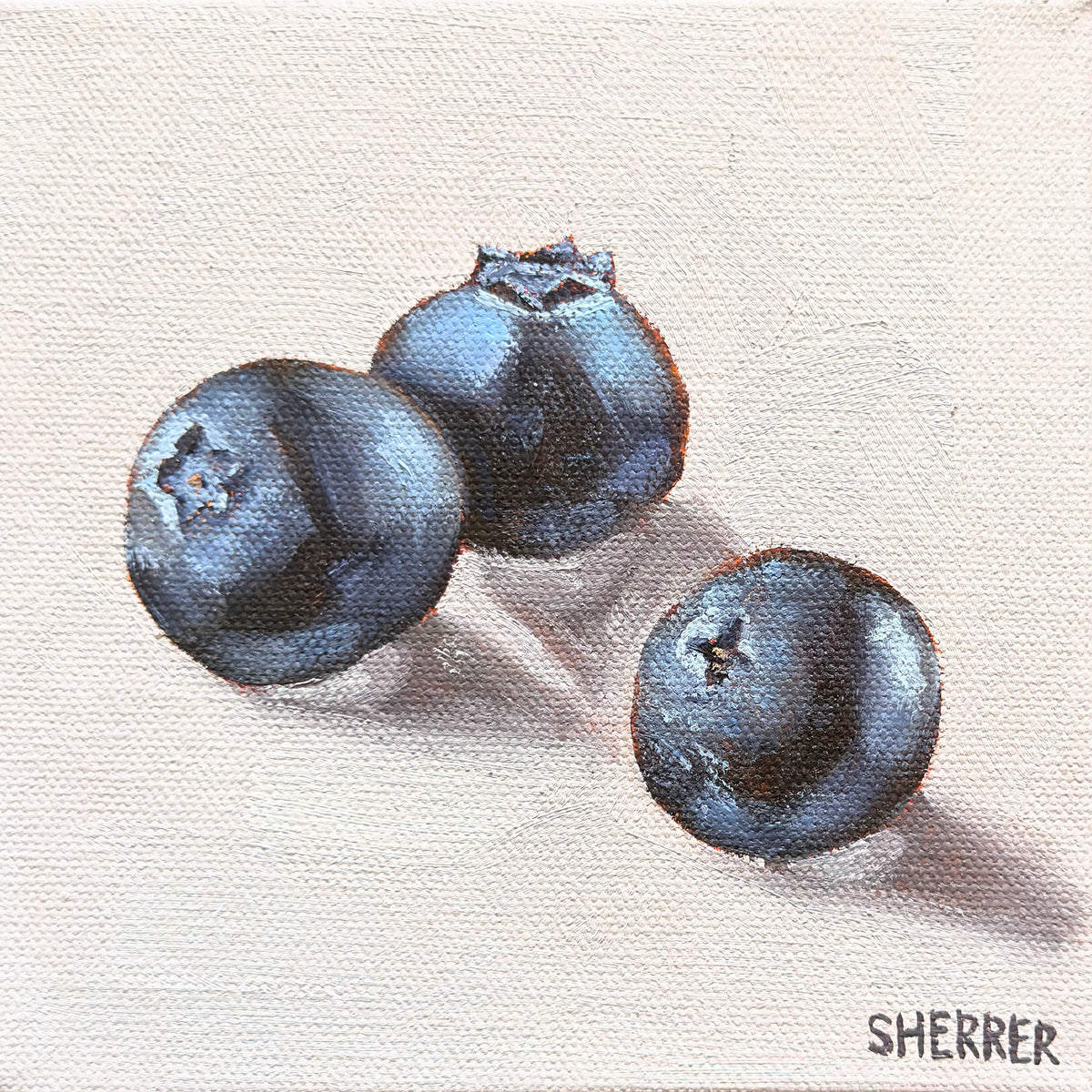 Gathered Together, original oil painting by Caroline Sherrer, featuring three ripe blueberries resting on a lavender background.