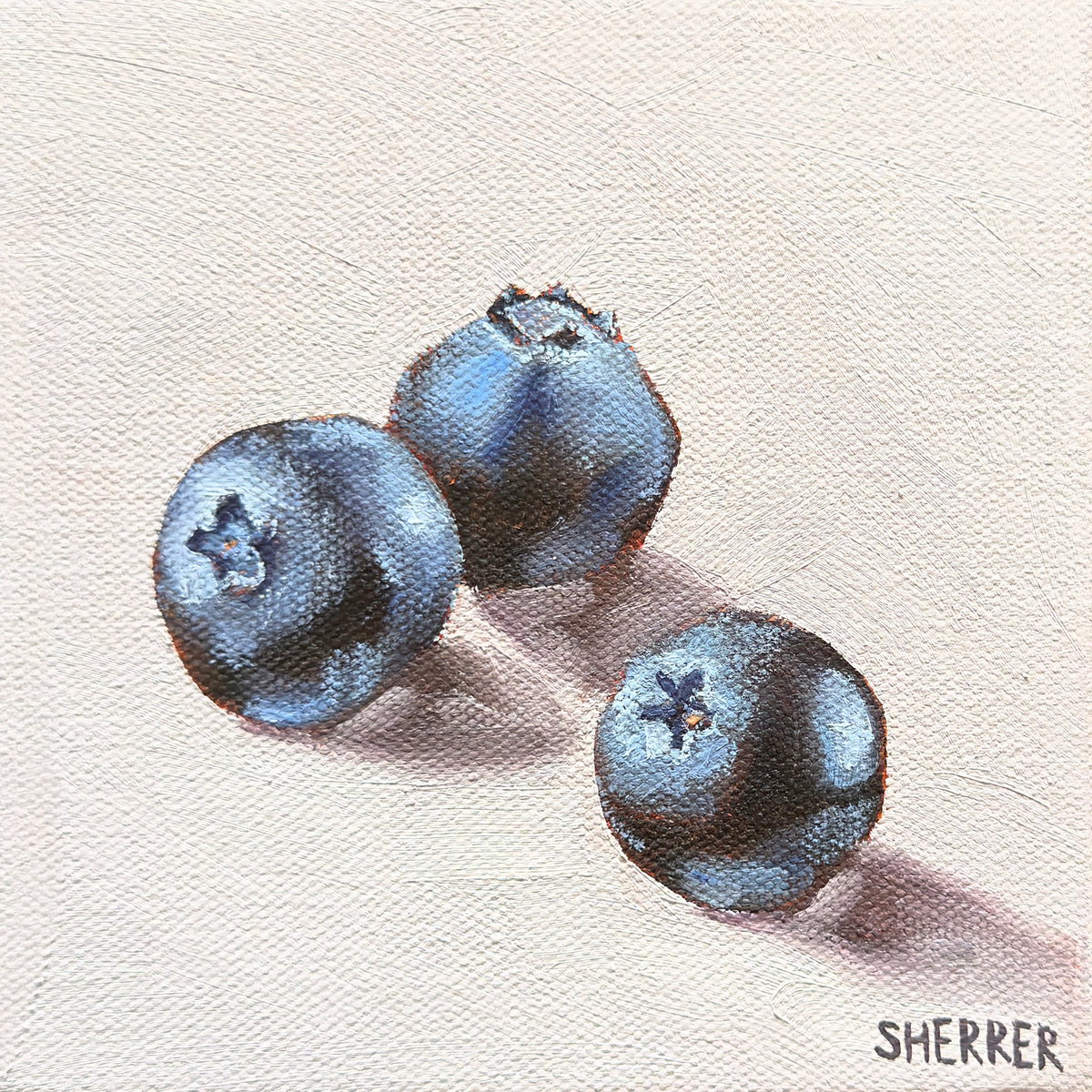 Lavender Harvest, original oil painting by Caroline Sherrer, featuring three ripe blueberries resting on a lavender background.