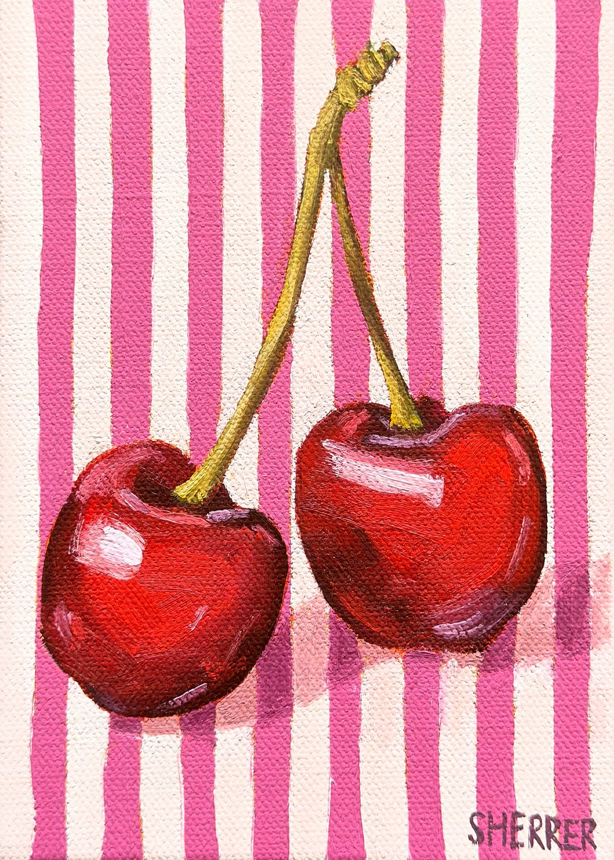 Picnic Weather, original oil painting by Caroline Sherrer, featuring two cherries resting on a pink and white striped background.